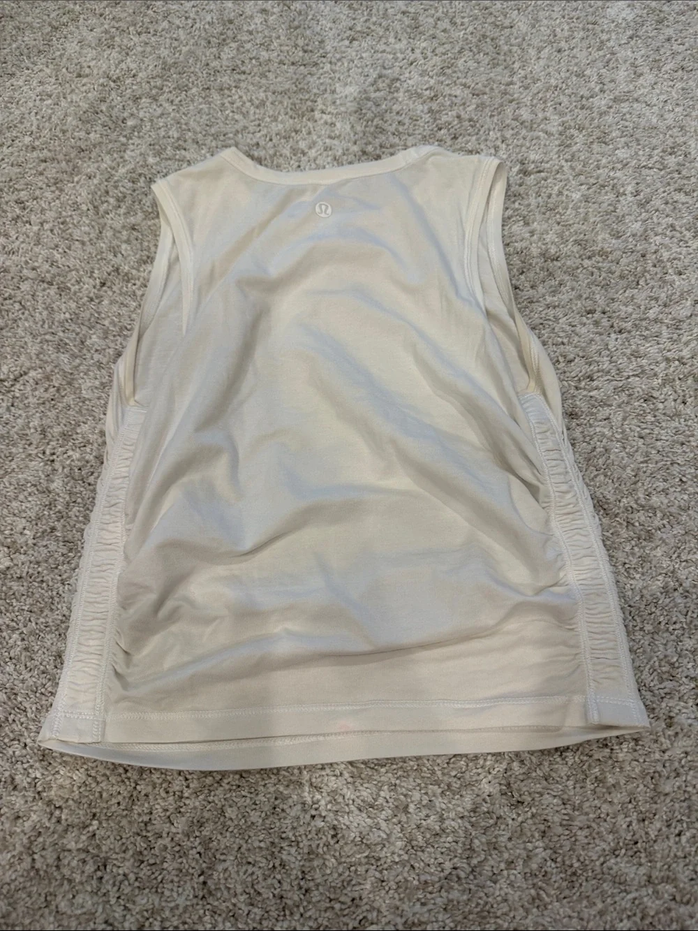 Lululemon white cinch side tank size 2. Great condition.